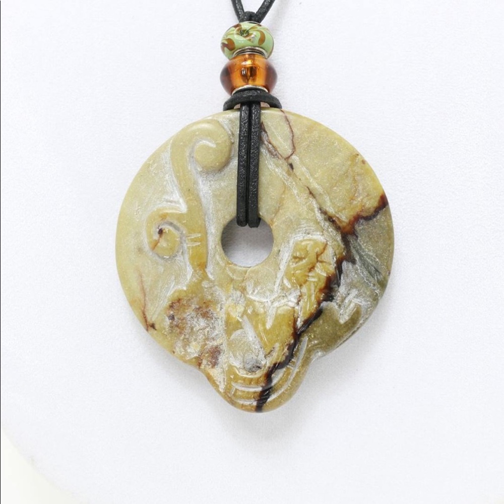 Serpentine pendants On Leather Jewelry
